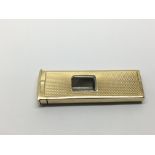 A 9ct gold cigar cutter, approx 17g.