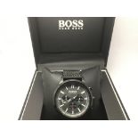 A boxed gents Hugo Boss chronograph watch.