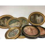 A collection of oval framed prints some 19th centu