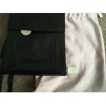 A new black leather Radley bag and cover.