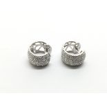 A pair of 9ct white gold diamond cluster earrings,