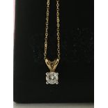 A Diamond pendant on 9 ct god chain