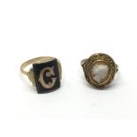 A 9ct gold black enamel ring and an unmarked gold