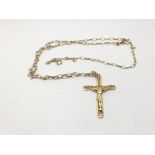 A 9ct gold crucifix on chain, approx 3.4g.
