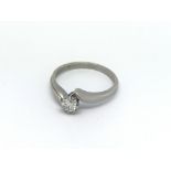 An 18ct white gold solitaire diamond ring, approx