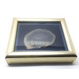A framed agate stone painted with sailing boats by