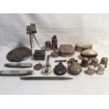 A collection of novelty silver and white metal ite