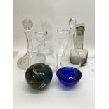 A collection of glass decanters a Madina vase and