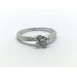 A platinum and diamond solitaire ring, approx 0.25