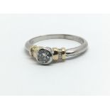 An 18ct white gold and solitaire diamond ring, app