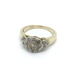 A 9carat gold ring set with a pattern of diamonds.