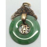 A Chinese green jade pendant, approx 5.3g.
