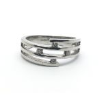 A 9ct white gold ring, with four small diamonds, r