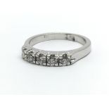 An 18ct white gold five stone diamond ring, approx