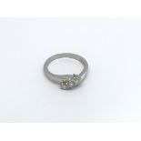 An 18carat white gold ring set with three brillian