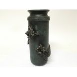 An oriental bronzed metal vase decorated with a ra