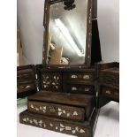 A 18 th century Chinese dressing chest the fitted