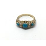 A 9ct gold ring set with turquoise and cultured pe