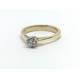 An 18ct yellow gold diamond solitaire ring, approx