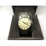 A boxed gents Gucci dress watch.