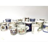 A collection of commemorative mugs including Georg