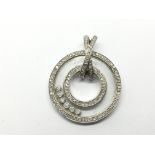 A 9ct white gold pendant set with diamonds, approx