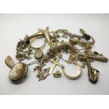 A collection of unmarked gold, gold earrings and o