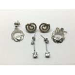 Three pairs of white gold earrings set with CZs, a