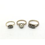 Two 9ct gold rings set with chip stone diamonds to