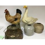 A ceramic model of a chicken life size a plaster f