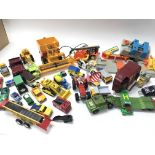 A Collection of loose diecast cars and a Playset b