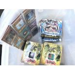 A Box containing a collection of Yu-Gi-OH! Cards i