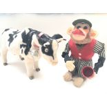 A boxed vintage Rosko Toy Josie walking cow and a