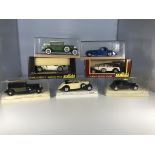 Seven Solido model cars in cases. A Cadillac 452 A