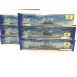A collection of Boxed Minic Ships, including H.M.S