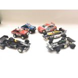 A collection of unboxed Scalextric, Ninco and STS