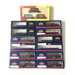 A collection of twelve boxed Bachmann OO gauge railway carriages and rolling stock plus a boxed