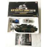 A boxed radio controlled battle tank type 90.