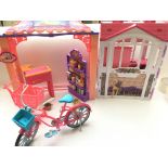 A Collection of Barbie houses, buildings and acces