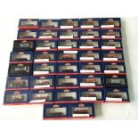 A collection of approx 30 plus boxed Bachmann OO gauge rolling stock.