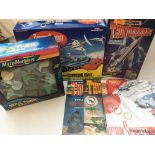 A collection toys including a Captain Scarlet comm