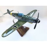 A Resin Messerschmitt ME109 on a stand. Wing span