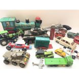 A collection of plastic, die cast toys