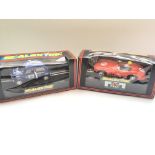 2 boxed Scalextric cars. A Motaworld Mini #C.393 a