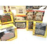 A collection of 12 Hornby, Scenix model buildings