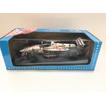 A Minichamps Nigel Mansell Indy car.boxed. (Road t