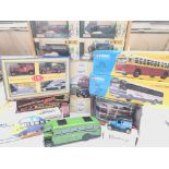 A collection boxed toy cars and busses various.(17