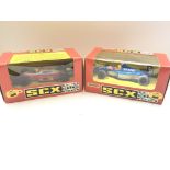 2 x Matchbox SCX model motor racing cars boxed. A