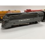 Lionel Lines 027, American 1688E locomotive and tin plate rolling stock.