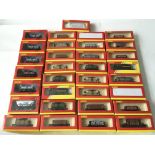 A collection of approx 30 plus boxed Hornby OO gauge rolling stock.
